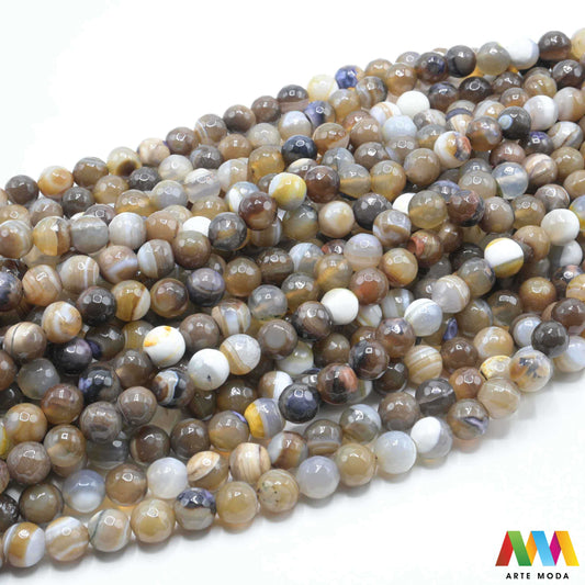 poludragi kamen ahat kristal kalcedon polu dragi poludrago kamenje dragulj mineral kvarc prirodni meditacija čakra zaštita snaga ravnoteža ljekovito perle stabilnost ahata jednog od najraznovrsnijih najljepših poludragih kamenja jedinstvenim trakama slojevima i šarenim uzorcima ahat je kamen stabilnosti uzemljenja i zaštite ahat u različitim oblicima od brušenih perli i glatkih kabošona do sirovih komada savršenih za izradu nakita meditaciju ili kao ukrasni element u vašem prostoru arte moda repromaterijal