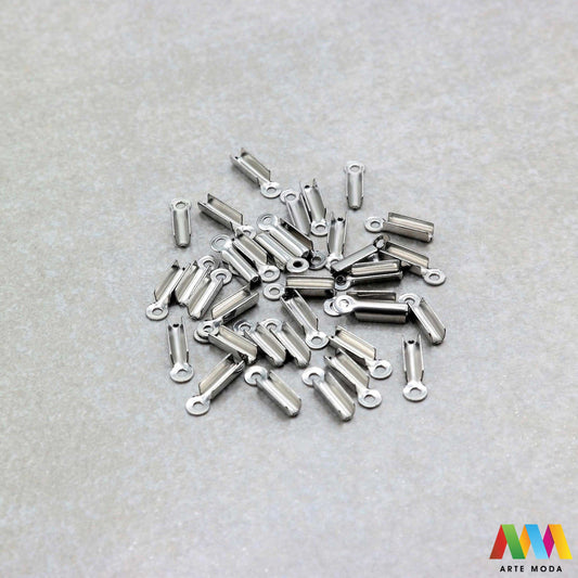 stiskači završeci spojnice priključci narukvice ogrlice koža lanac guma konop čelik repromaterijal čelični repro nehrđajući Visokokvalitetni Stiskači od nehrđajućeg čelika za izradu unikatnog nakita Idealni za kožu flaks gumu i druge materijale Otporni na koroziju i habanje savršeni za izradu narukvica ili ogrlica Jednostavna montaža dugotrajnost i elegantan dizajn