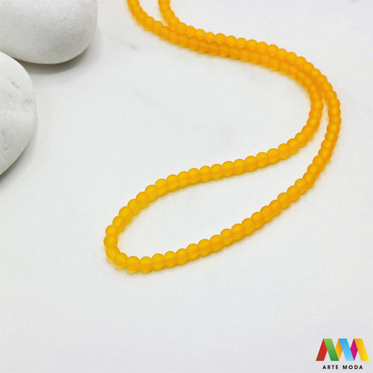 stakleni niz staklo perle zrna zrno staklena perla okrugle okrugla Staklene okrugle perle koje služe za nizanje i izradu nakita poput narukvica i ogrlica te torbica i ostalih modnih dodataka