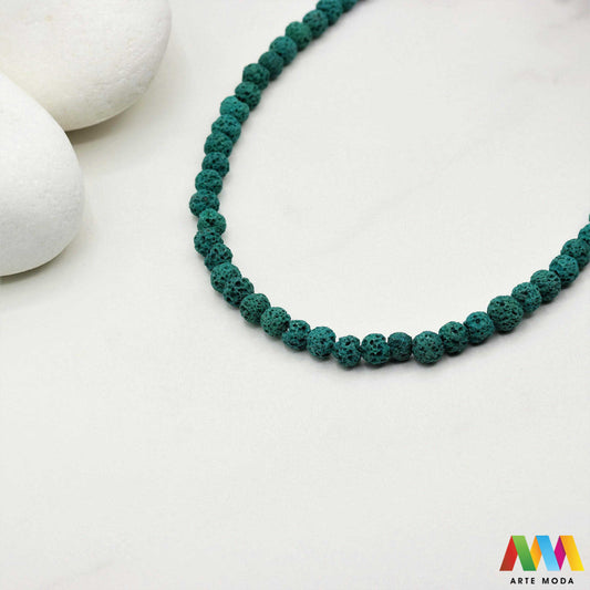 lava kamen vulkanska perle poludragi prirodni mat eterična ulja aromaterapija nakit izrada DIY repromaterijal mineral kristal narukvica ogrlica Tražite jedinstveni materijal za nakit Vulkanska lava je poludragi kamen s moćnom pričom Njegova porozna mat tekstura savršena je za izradu aromaterapijskog nakita jer sjajno upija i difuzira eterična ulja Lagan je simbolizira snagu i uzemljenje te je idealan za unisex i muške narukvice i ogrlice arte moda repromaterijal