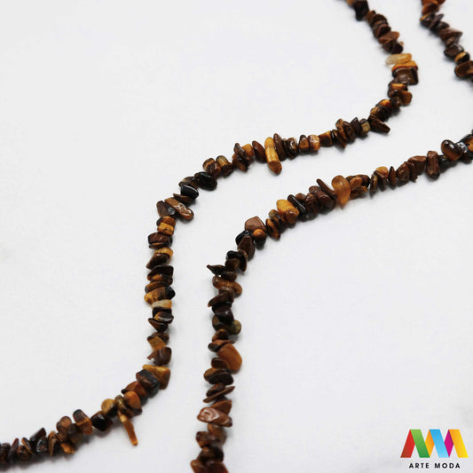 poludragi kamen čips kamenčići nakit diy ručni rad prirodni mineral kristal Tigrovo oko Mali komadići prirodnog kamena različitih boja i tekstura idealni za izradu nakita dekoracija i umjetničkih projekata U našoj ponudi pronaći ćete široki izbor čipsa od popularnih poludragih kamenja poput ahata tirkiza ametista i mnogih drugih