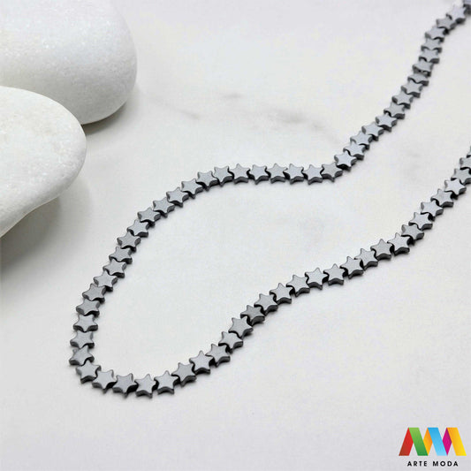 hematit krvavi kamen poludragi mineral metalni sjaj kvarc zrcalo kristal prirodni metalik meditacija zaštita repromaterijal Hematit (ili krvavi kamen) je prirodni mineral smeđe sive ili crne boje karakteriziran prisustvom hladnog metalnog sjaja Vjeruje se da pomaže u jačanju volje samopouzdanja i povezanosti s majkom zemljom Nakit izrađen od njega fascinira svojim tajanstvenim zrcalnim sjajem