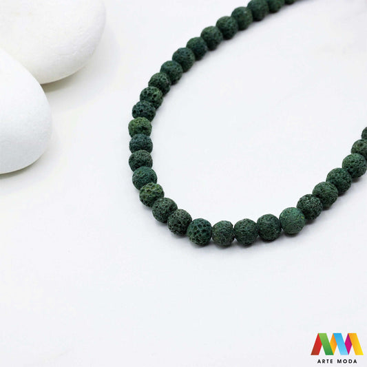 lava kamen vulkanska perle poludragi prirodni mat eterična ulja aromaterapija nakit izrada DIY repromaterijal mineral kristal narukvica ogrlica Tražite jedinstveni materijal za nakit Vulkanska lava je poludragi kamen s moćnom pričom Njegova porozna mat tekstura savršena je za izradu aromaterapijskog nakita jer sjajno upija i difuzira eterična ulja Lagan je simbolizira snagu i uzemljenje te je idealan za unisex i muške narukvice i ogrlice arte moda repromaterijal