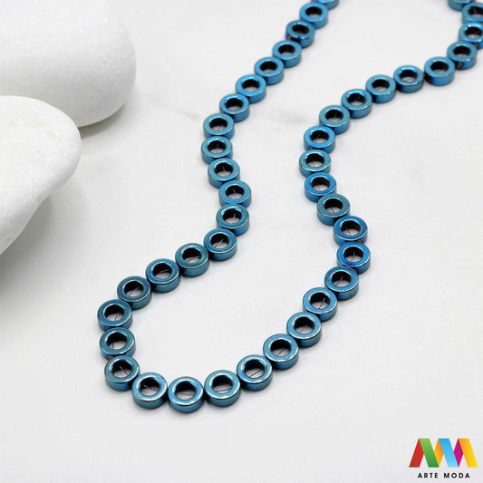 hematit krvavi kamen poludragi mineral metalni sjaj kvarc zrcalo kristal prirodni metalik meditacija zaštita repromaterijal Hematit (ili krvavi kamen) je prirodni mineral smeđe sive ili crne boje karakteriziran prisustvom hladnog metalnog sjaja Vjeruje se da pomaže u jačanju volje samopouzdanja i povezanosti s majkom zemljom Nakit izrađen od njega fascinira svojim tajanstvenim zrcalnim sjajem