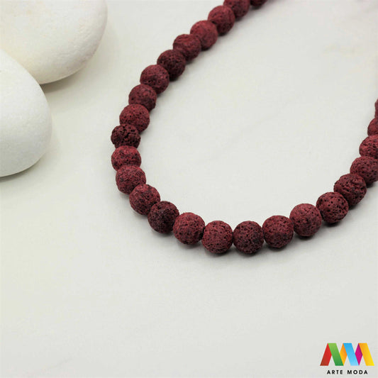 lava kamen vulkanska perle poludragi prirodni mat eterična ulja aromaterapija nakit izrada DIY repromaterijal mineral kristal narukvica ogrlica Tražite jedinstveni materijal za nakit Vulkanska lava je poludragi kamen s moćnom pričom Njegova porozna mat tekstura savršena je za izradu aromaterapijskog nakita jer sjajno upija i difuzira eterična ulja Lagan je simbolizira snagu i uzemljenje te je idealan za unisex i muške narukvice i ogrlice arte moda repromaterijal